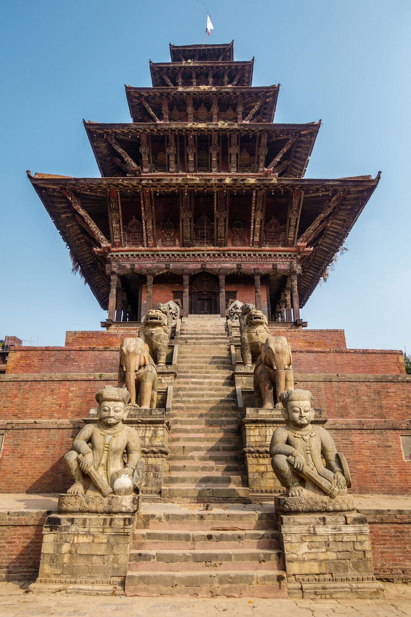 Nyatapola Temple in Bhaktapur showcasing traditional Newar pagoda-style architecture with tiered design and stone guardian statues.